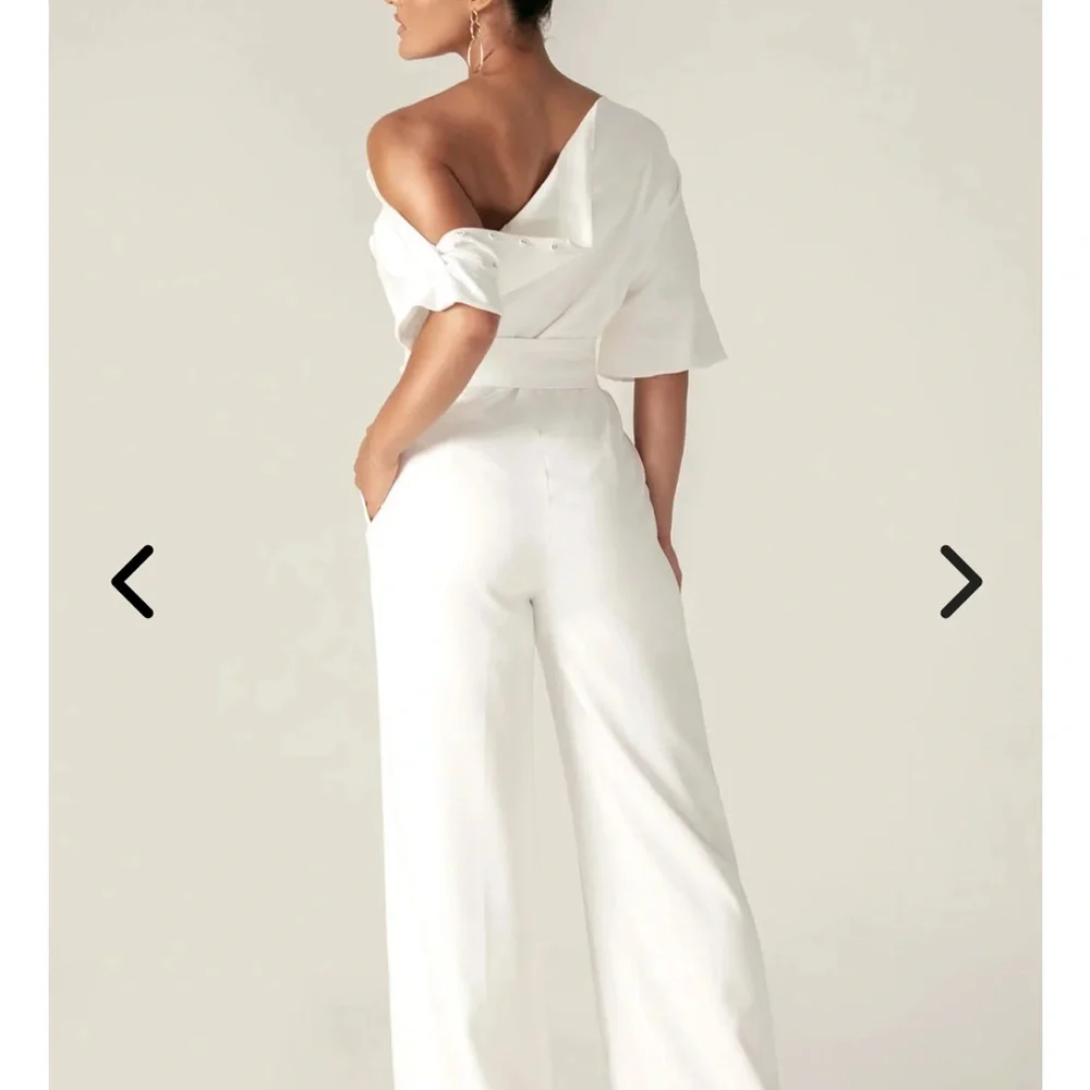 Ana Off-Shoulder Belted Jumpsuit in White - Picture 4 of 15